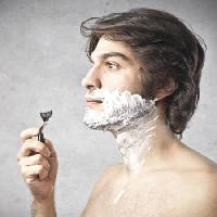Pixwords Das Bild mit Rasiermesser, ein Mann, Schaum, Haar, Klinge Bowie15 - Dreamstime